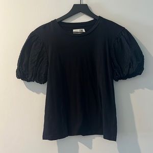 Black top with short textured puffy sleeves